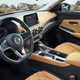 And now the 2021 Sentra’s cabin. The diamond-patterned seats, the circular climate vents, the thinner wheel, the colors. That’s more like it!